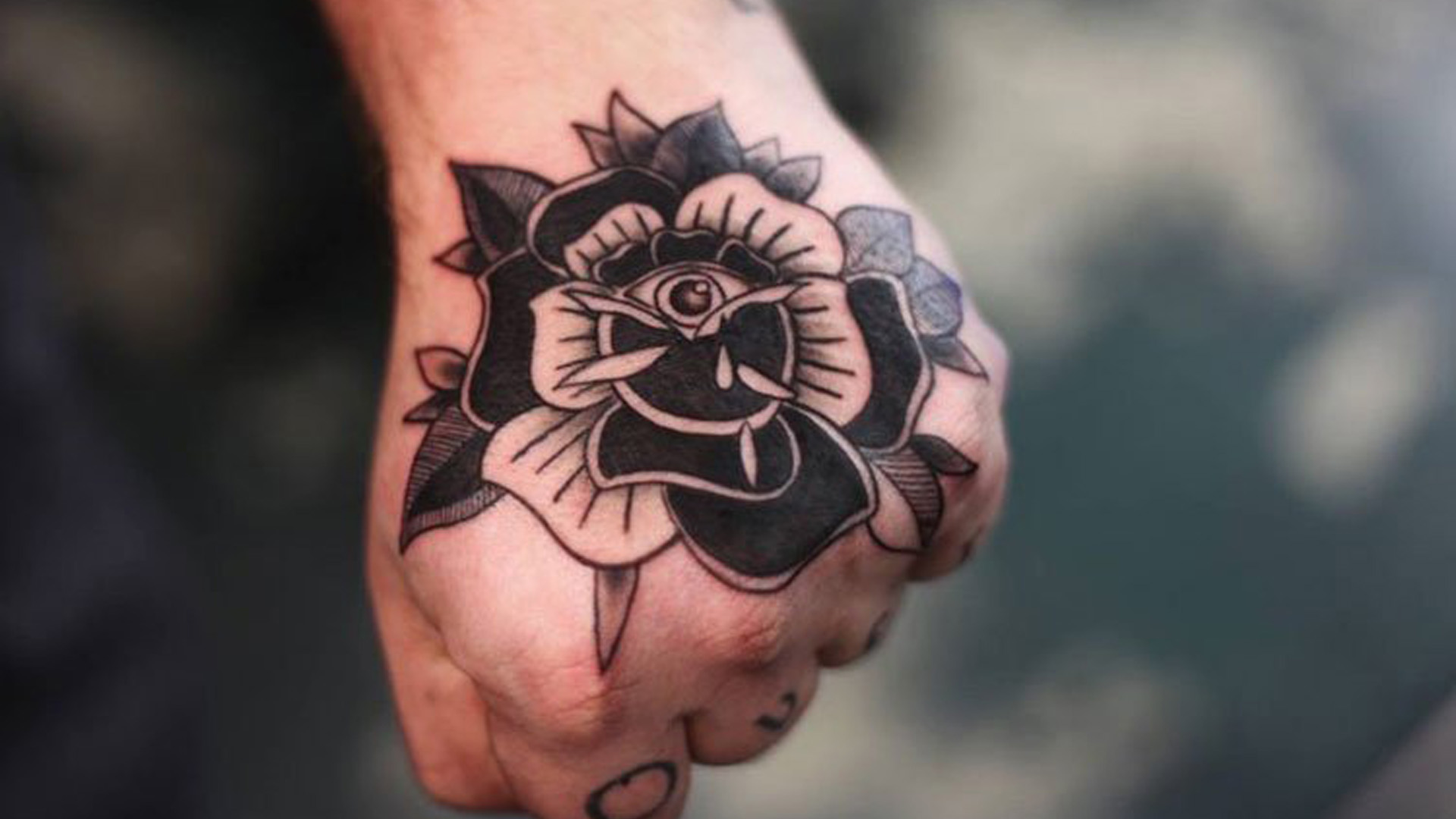 Rose Tattoo on a hand